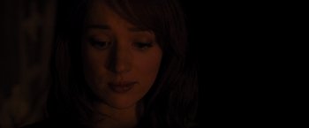 Movie still from “The Cabin in the Woods” (2011), directed by Drew Goddard – A woman's face in the dark; Close Up shot, High angle