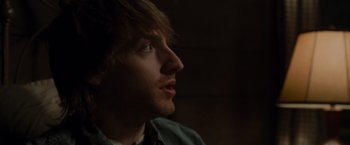Movie still from “The Cabin in the Woods” (2011), directed by Drew Goddard – A person looking up at something; Close Up shot, Low angle