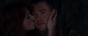 Movie still from “The Cabin in the Woods” (2011), directed by Drew Goddard – A man and a woman kissing in a dark room; Close Up shot, Low angle