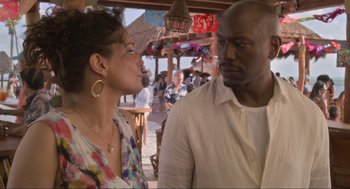 Movie still from “The Christmas Chronicles: Part Two” (2020), directed by Chris Columbus – A man and a woman standing next to each other; Medium shot, Over the shoulder angle