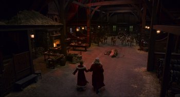 Movie still from “The Christmas Chronicles: Part Two” (2020), directed by Chris Columbus – A couple of people that are standing in a room; Extreme Wide shot, High angle