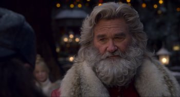 Movie still from “The Christmas Chronicles: Part Two” (2020), directed by Chris Columbus – An old man with a long white beard; Close Up shot, Over the shoulder angle