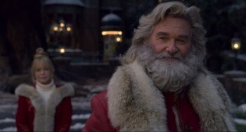 Movie still from “The Christmas Chronicles: Part Two” (2020), directed by Chris Columbus – A person with a beard; Close Up shot, Over the shoulder angle