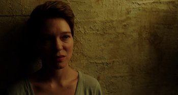 Movie still from “Crimes of the Future” (2022), directed by David Cronenberg – A person with short brown hair; Close Up shot, Low angle