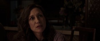 Movie still from “The Conjuring: The Devil Made Me Do It” (2021), directed by Michael Chaves – A person sitting in a room; Close Up shot, Over the shoulder angle