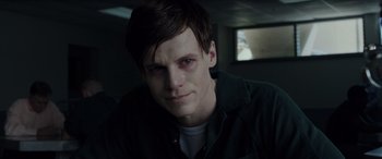 Movie still from “The Conjuring: The Devil Made Me Do It” (2021), directed by Michael Chaves – A person wearing a shirt; Close Up shot, Over the shoulder angle