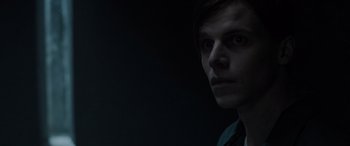 Movie still from “The Conjuring: The Devil Made Me Do It” (2021), directed by Michael Chaves – A young man is looking into the camera; Close Up shot, Over the shoulder angle