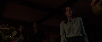 Movie still from “The Conjuring: The Devil Made Me Do It” (2021), directed by Michael Chaves – A man and a woman standing next to each other in a room; Medium shot, Over the shoulder angle