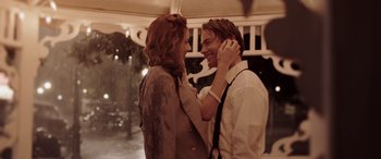 Movie still from “The Conjuring: The Devil Made Me Do It” (2021), directed by Michael Chaves – A man and a woman are dancing together outside; Medium shot, Low angle