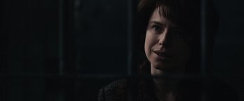 Movie still from “The Courier” (2020), directed by Dominic Cooke – A person looking out of a window; Close Up shot, Over the shoulder angle