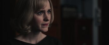Movie still from “The Courier” (2020), directed by Dominic Cooke – A person with short hair; Close Up shot, Over the shoulder angle