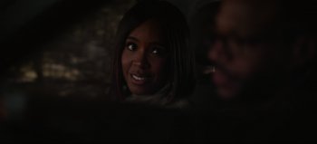 Movie still from “The Curse of Bridge Hollow” (2022), directed by Jeff Wadlow – A person smiling at the camera; Close Up shot, Over the shoulder angle