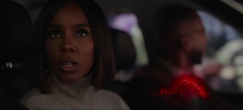 Movie still from “The Curse of Bridge Hollow” (2022), directed by Jeff Wadlow – A person sitting in a car; Close Up shot, Over the shoulder angle