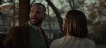 Movie still from “The Curse of Bridge Hollow” (2022), directed by Jeff Wadlow – A man and a woman talking to each other outside; Close Up shot, Over the shoulder angle