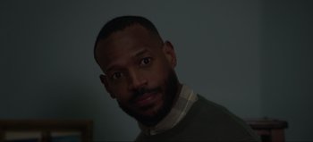 Movie still from “The Curse of Bridge Hollow” (2022), directed by Jeff Wadlow – A person with a beard; Close Up shot, Over the shoulder angle