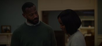 Movie still from “The Curse of Bridge Hollow” (2022), directed by Jeff Wadlow – A man and a woman standing next to each other; Medium shot, Over the shoulder angle