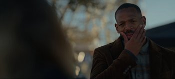 Movie still from “The Curse of Bridge Hollow” (2022), directed by Jeff Wadlow – A person wearing a jacket; Close Up shot, Over the shoulder angle