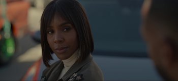 Movie still from “The Curse of Bridge Hollow” (2022), directed by Jeff Wadlow – A person wearing a jacket; Close Up shot, Over the shoulder angle