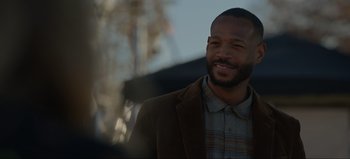 Movie still from “The Curse of Bridge Hollow” (2022), directed by Jeff Wadlow – A person wearing a jacket; Close Up shot, Over the shoulder angle