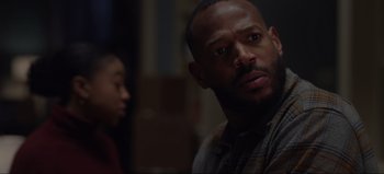 Movie still from “The Curse of Bridge Hollow” (2022), directed by Jeff Wadlow – A person sitting in front of another person; Close Up shot, Over the shoulder angle