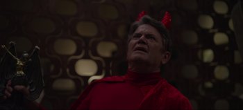 Movie still from “The Curse of Bridge Hollow” (2022), directed by Jeff Wadlow – A man in a red shirt with horns on his head; Close Up shot, High angle