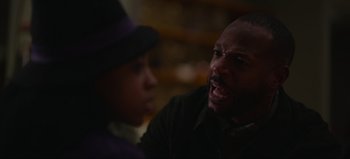 Movie still from “The Curse of Bridge Hollow” (2022), directed by Jeff Wadlow – A man and a woman talking to each other; Close Up shot, Over the shoulder angle