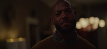 Movie still from “The Curse of Bridge Hollow” (2022), directed by Jeff Wadlow – A person wearing a sweater; Close Up shot, Low angle