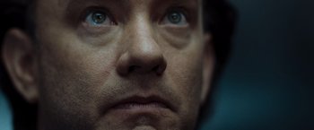 Movie still from “The Da Vinci Code” (2006), directed by Ron Howard – A man's face with blue eyes; Extreme Close Up shot, Overhead angle