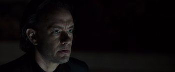 Movie still from “The Da Vinci Code” (2006), directed by Ron Howard – A person looking at the camera; Close Up shot, Low angle