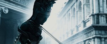 Movie still from “The Da Vinci Code” (2006), directed by Ron Howard – A statue of a man with a sword; Close Up shot, Low angle