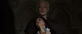 Movie still from “The Da Vinci Code” (2006), directed by Ron Howard – A man and a woman holding a pair of knifes; Close Up shot, Low angle