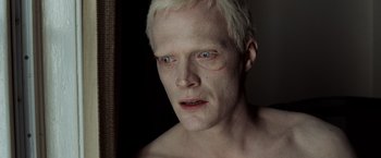 Movie still from “The Da Vinci Code” (2006), directed by Ron Howard – A person with white hair; Close Up shot, High angle