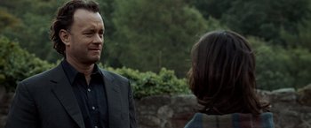 Movie still from “The Da Vinci Code” (2006), directed by Ron Howard – A man and a woman are talking outside; Close Up shot, Over the shoulder angle