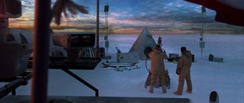 Movie still from “The Day After Tomorrow” (2004), directed by Roland Emmerich – A man is standing in front of an airplane; Extreme Wide shot, High angle