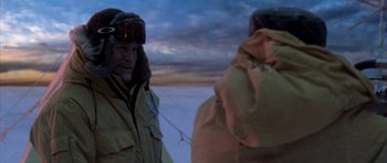 Movie still from “The Day After Tomorrow” (2004), directed by Roland Emmerich – A man and a woman wearing winter coats and hats; Medium shot, Over the shoulder angle