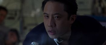 Movie still from “The Day After Tomorrow” (2004), directed by Roland Emmerich – A person with a microphone; Close Up shot, Low angle