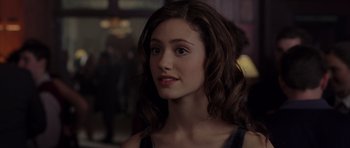 Movie still from “The Day After Tomorrow” (2004), directed by Roland Emmerich – A person with long brown hair; Close Up shot, Over the shoulder angle