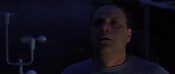 Movie still from “The Day After Tomorrow” (2004), directed by Roland Emmerich – A person looking up at the sky; Close Up shot, Low angle