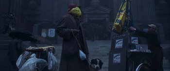 Movie still from “The Day After Tomorrow” (2004), directed by Roland Emmerich – A man walking a dog down the stairs; Wide shot, Low angle