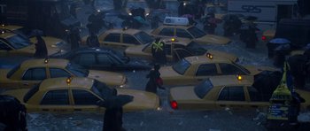 Movie still from “The Day After Tomorrow” (2004), directed by Roland Emmerich – A bunch of yellow taxis are in a flooded area; Extreme Wide shot, High angle