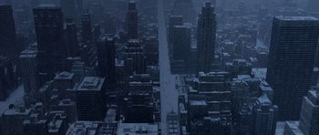 Movie still from “The Day After Tomorrow” (2004), directed by Roland Emmerich – An aerial view of a large city in the middle of the night; Extreme Wide shot, High angle