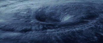 Movie still from “The Day After Tomorrow” (2004), directed by Roland Emmerich – A view of the ocean from a plane; Extreme Wide shot, Overhead angle