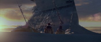 Movie still from “The Day After Tomorrow” (2004), directed by Roland Emmerich – Two people are standing in front of an abandoned ship; Extreme Wide shot, Low angle