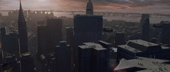 Movie still from “The Day After Tomorrow” (2004), directed by Roland Emmerich – An aerial view of a large city with skyscrapers; Extreme Wide shot, High angle
