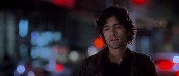 Movie still from “The Devil Wears Prada” (2006), directed by David Frankel – A person wearing a jacket; Close Up shot, Over the shoulder angle