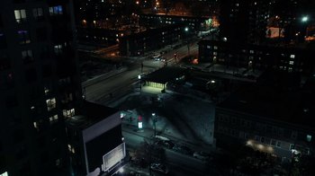 Movie still from “The Dissident” (2020), directed by Bryan Fogel – An aerial view of a city street at night; Extreme Wide shot, High angle