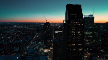 Movie still from “The Dissident” (2020), directed by Bryan Fogel – A view of a city at night from a skyscraper; Extreme Wide shot, High angle