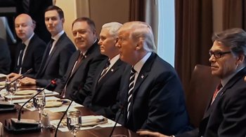 Movie still from “The Dissident” (2020), directed by Bryan Fogel – A group of men sitting at a long table; Medium shot, Over the shoulder angle