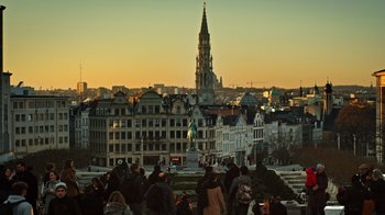 Movie still from “The Dissident” (2020), directed by Bryan Fogel – A group of people standing on top of a building; Extreme Wide shot, High angle