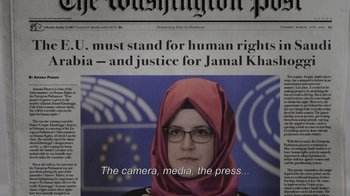 Movie still from “The Dissident” (2020), directed by Bryan Fogel – A woman wearing glasses and a head covering; Extreme Close Up shot, Low angle